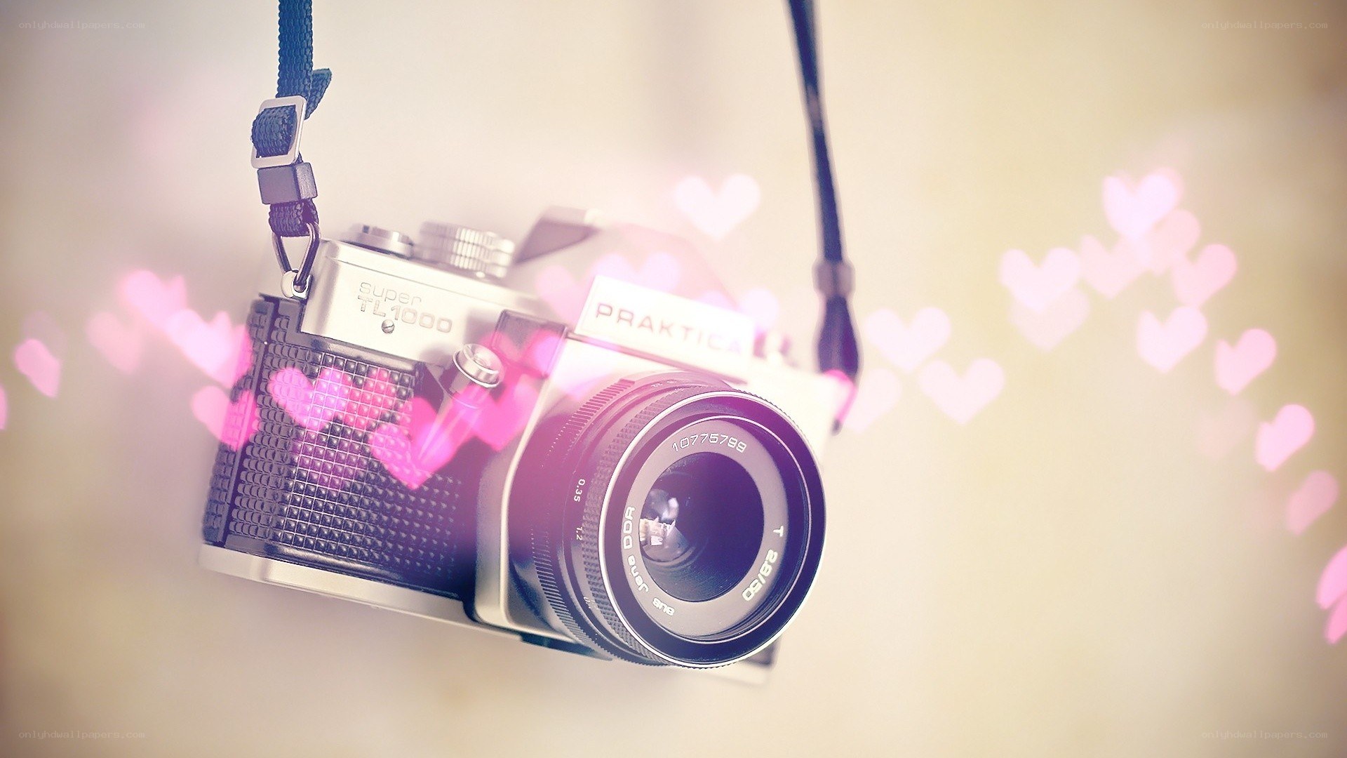vintage camera with heart bokeh
