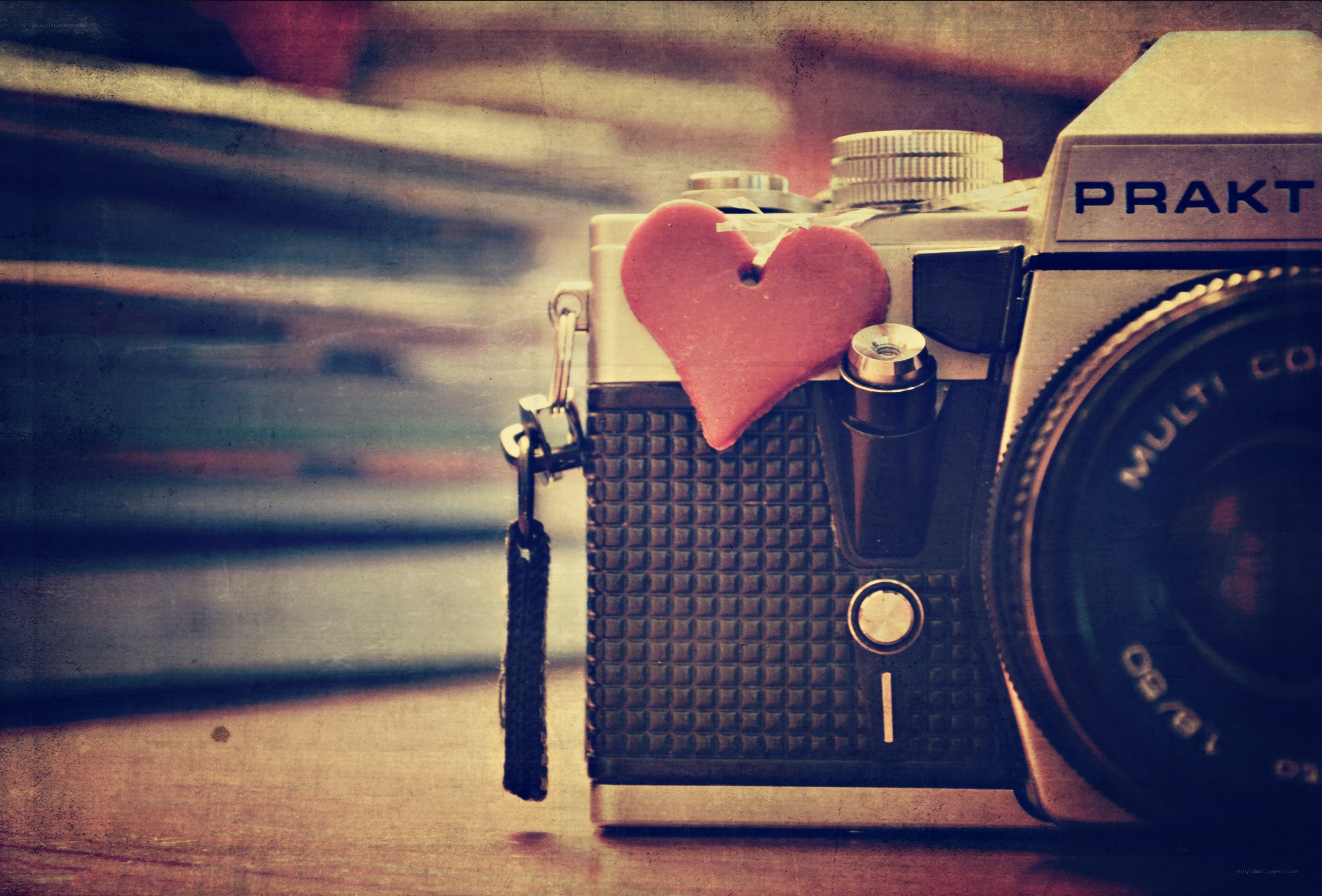 vintage camera with heart charm