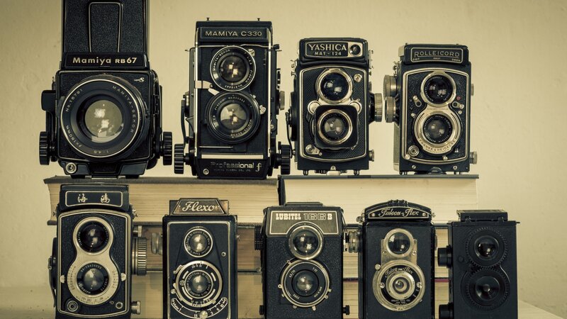 Vintage Cameras on Books