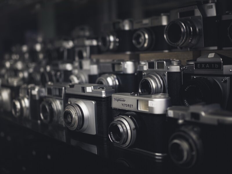 Vintage Cameras on Display — Black, Dramatic