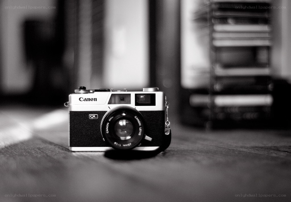 vintage canon camera on wood