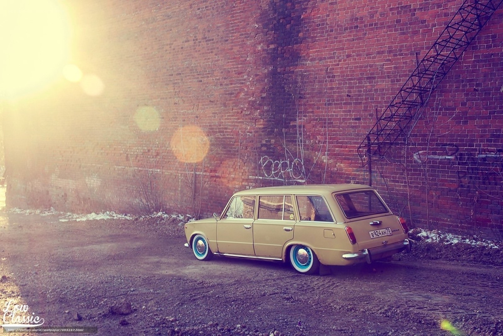 vintage car against brick wall