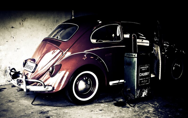 Vintage car at a gas station