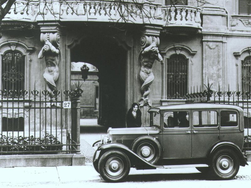 Vintage car at ornate building