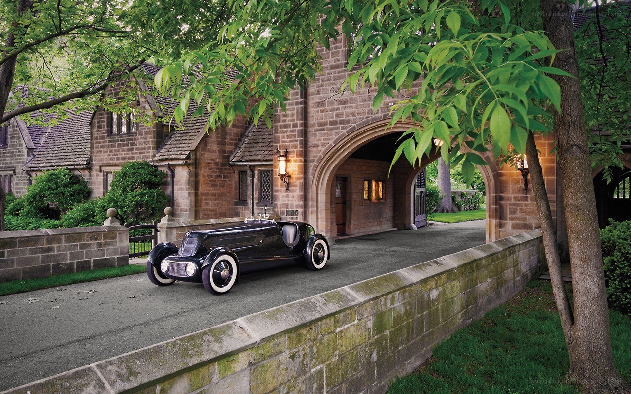 Vintage car at stone estate