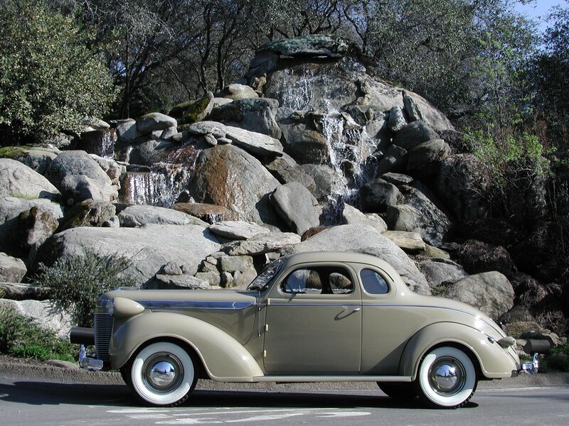 Vintage Car by Waterfall