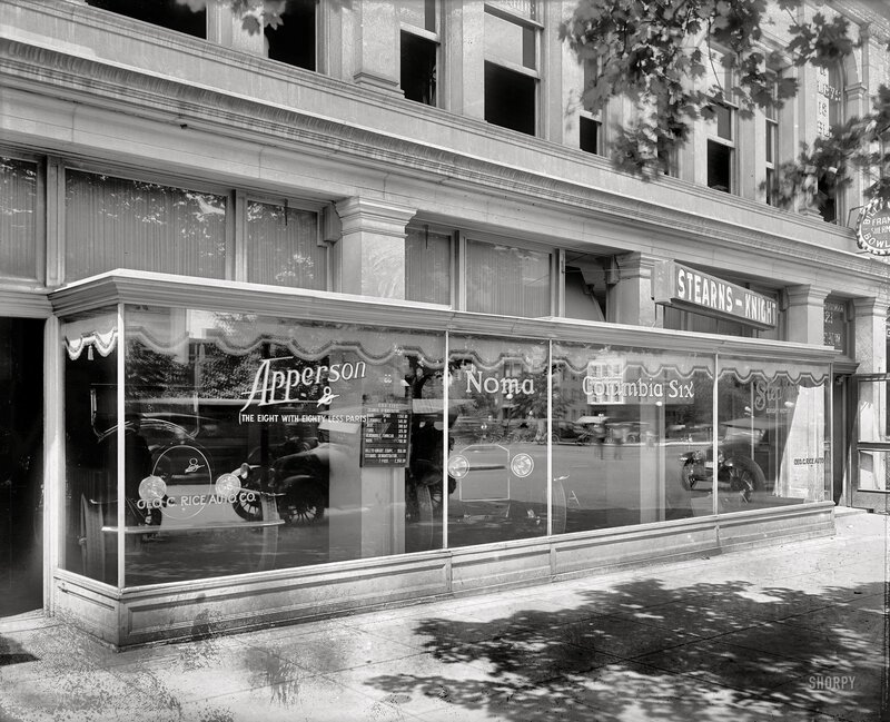 Vintage car dealership storefront