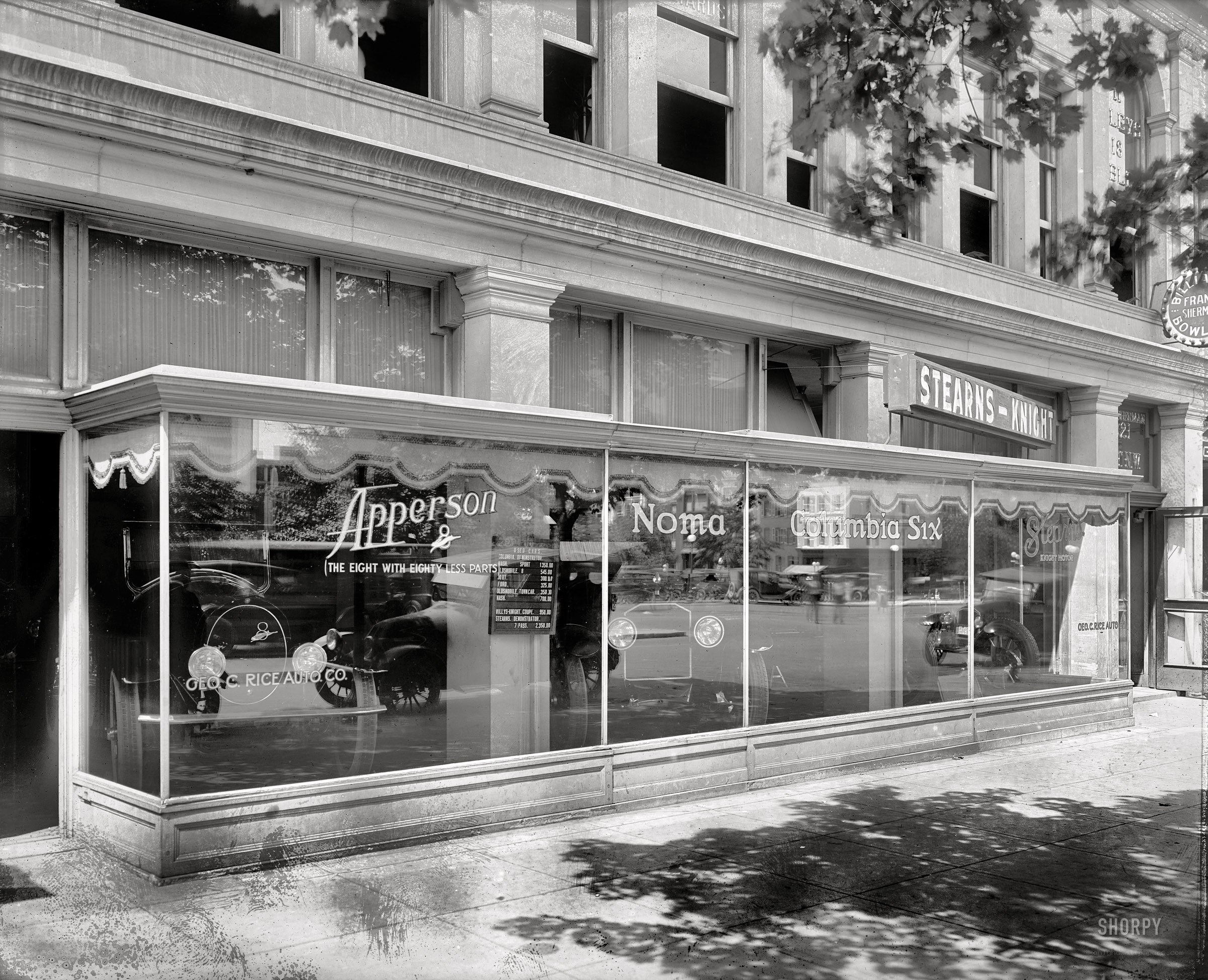 Vintage car dealership storefront
