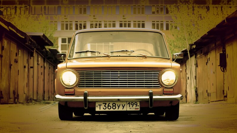 Vintage car in alleyway