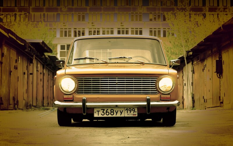 Vintage car in alleyway