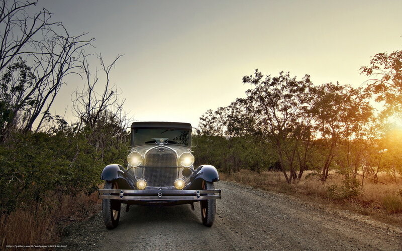 Vintage car on a dirt road