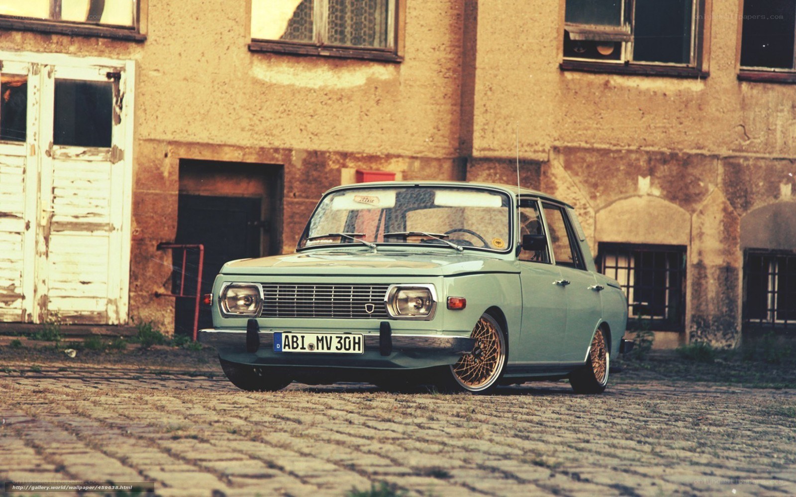 vintage car on cobblestones