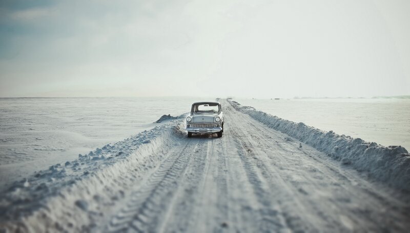 Vintage Car on Snowy Road — White