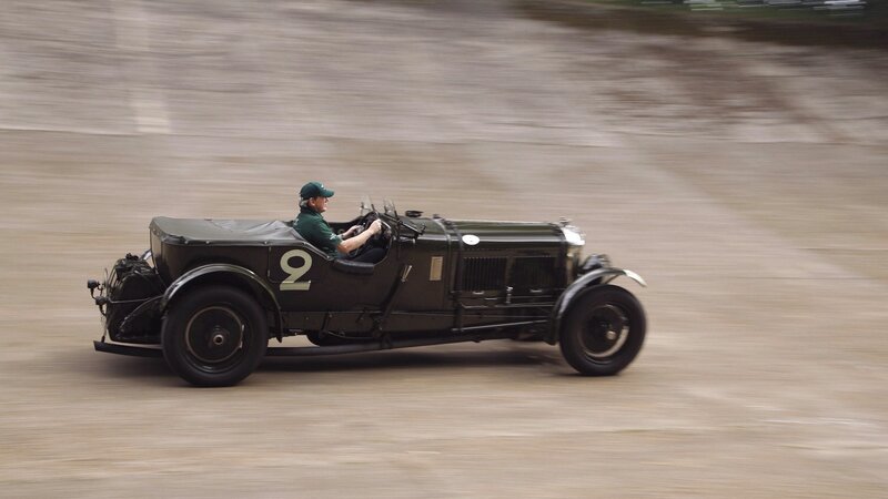 Vintage car racing on dirt