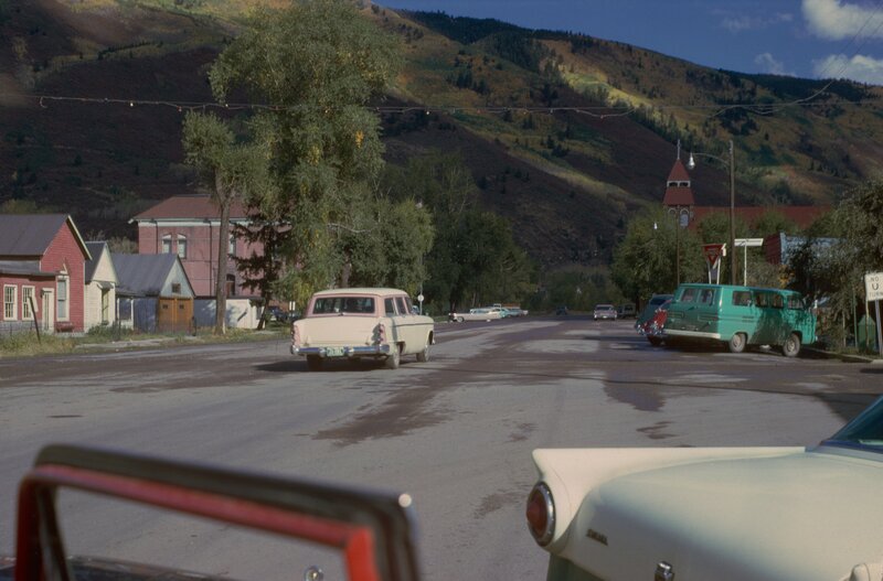 Vintage cars in a mountain town