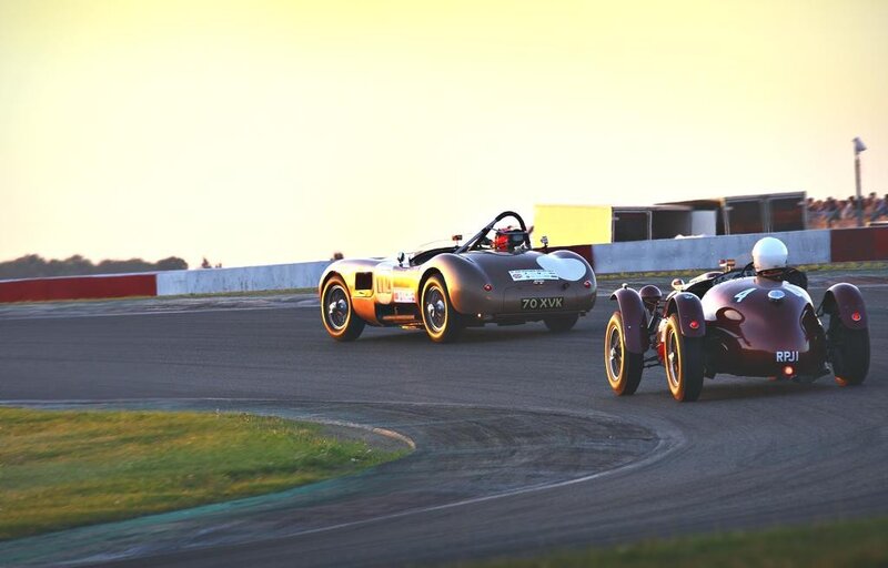Vintage cars racing on a track
