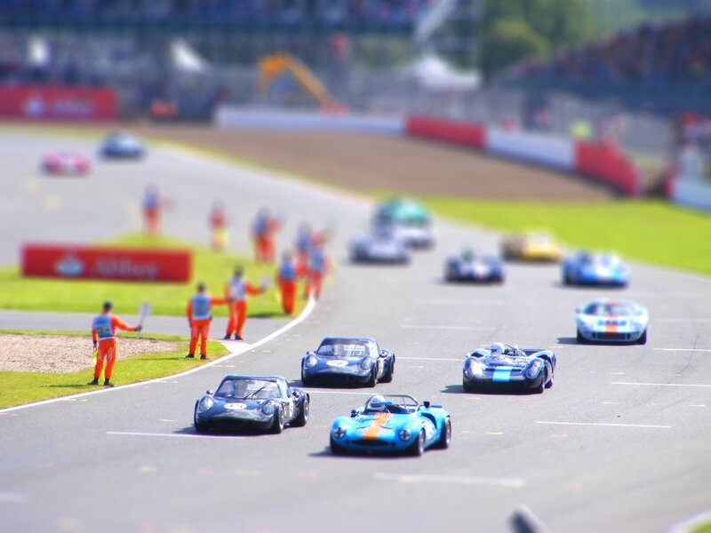 Vintage cars racing on track