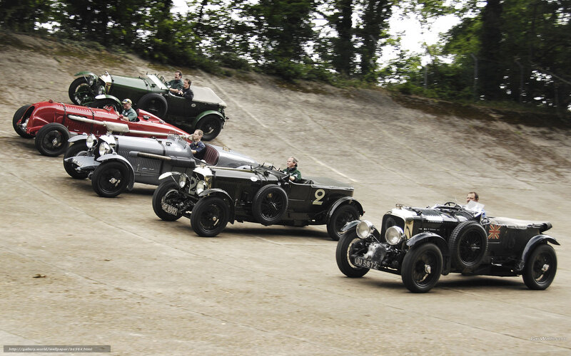 Vintage cars racing on track