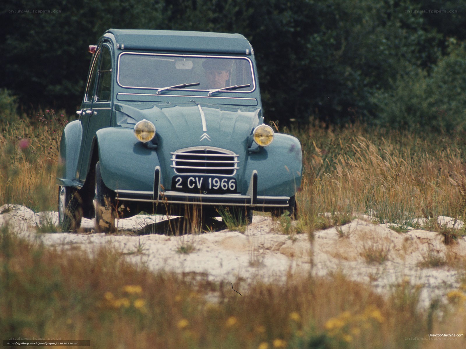 Vintage Citroen 2CV on a dirt path