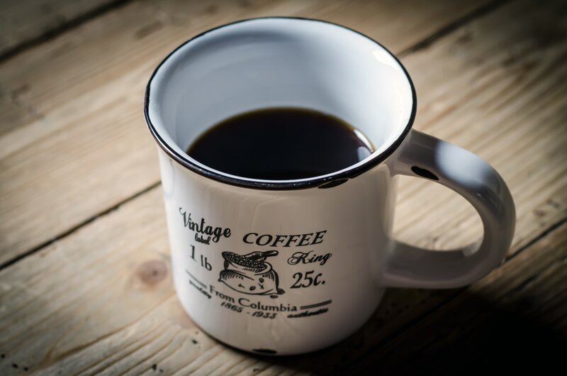 vintage coffee mug on wood