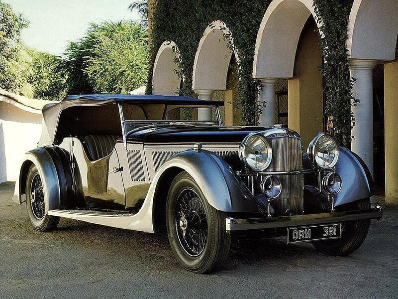 Vintage Convertible Car — Black, Serene, Afternoon, Photograph, Building