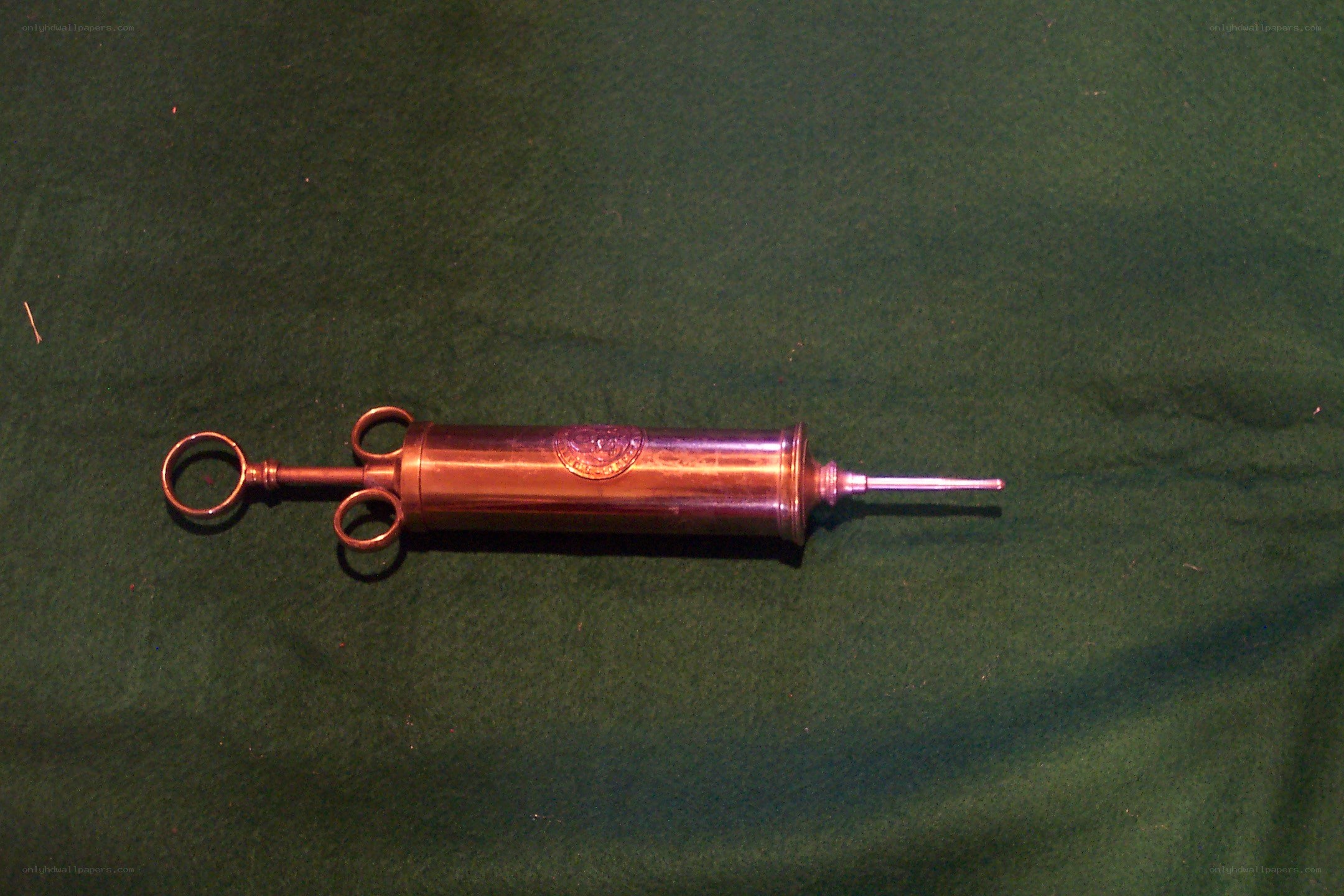 vintage copper syringe