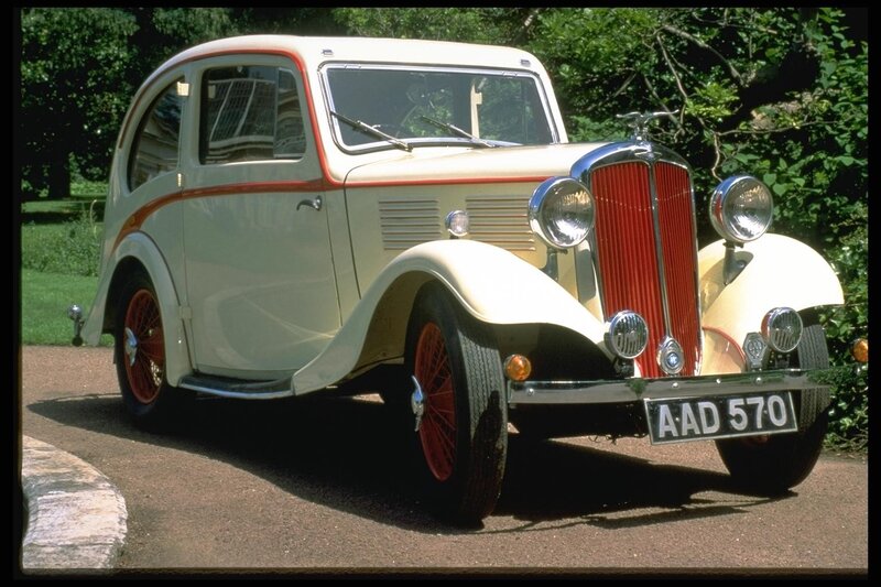 vintage cream car with red accents