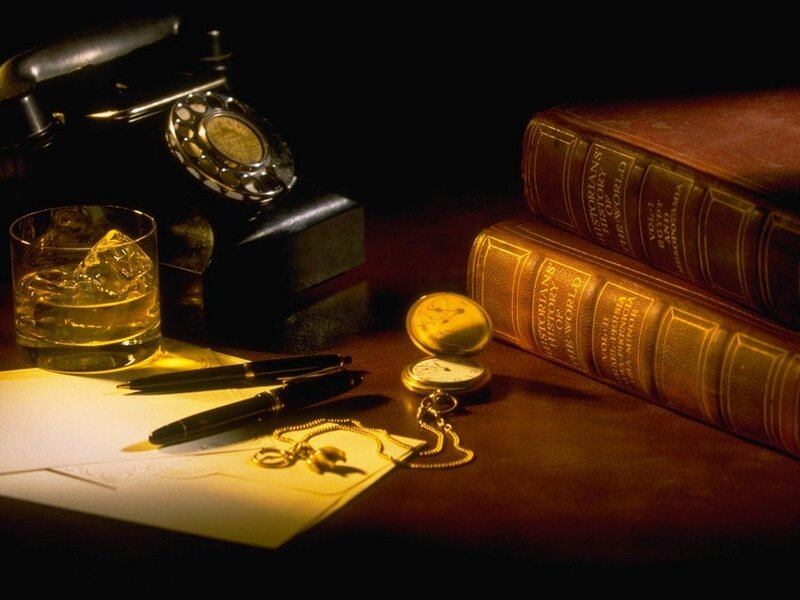 Vintage desk with books and phone