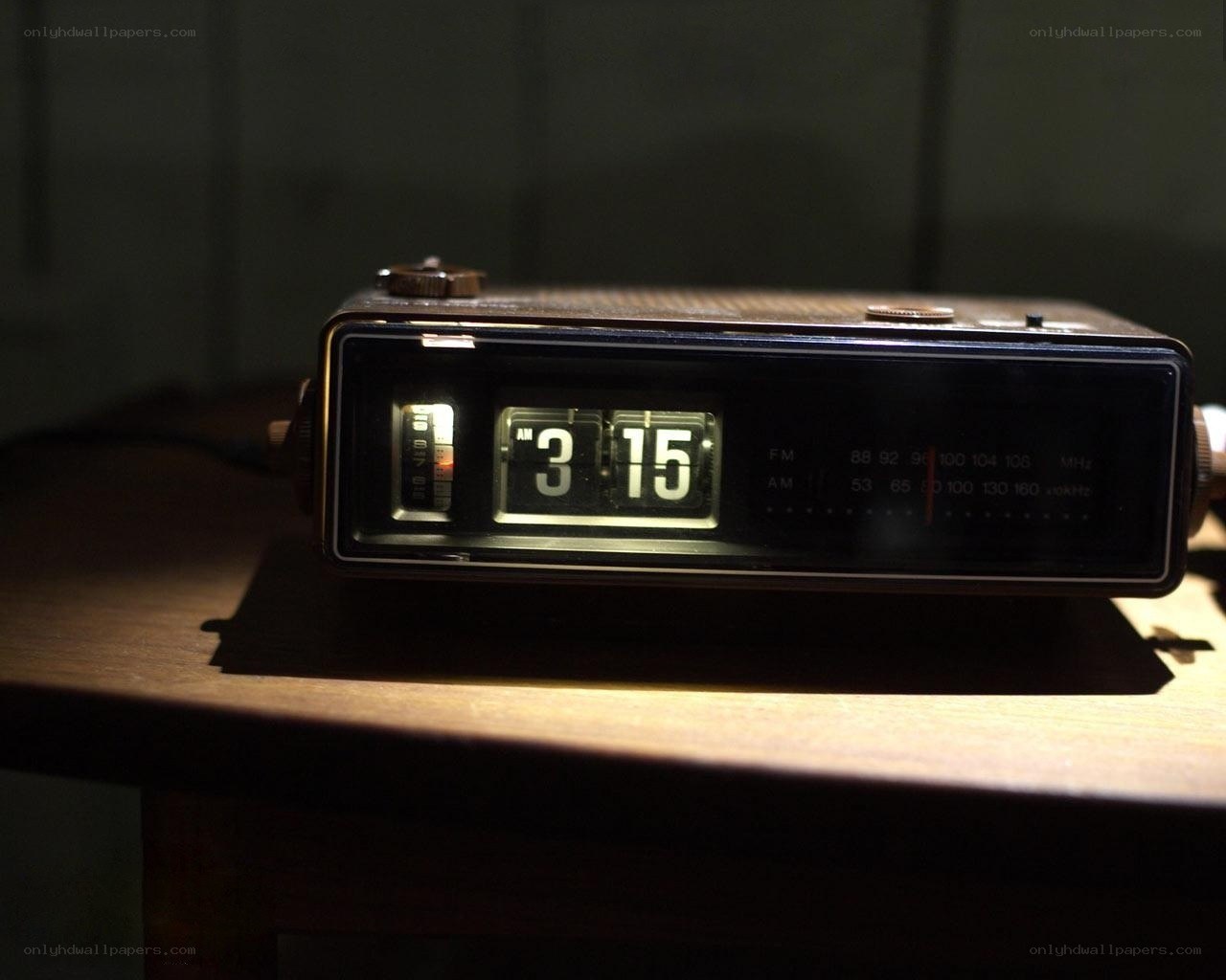 vintage flip clock on wooden table