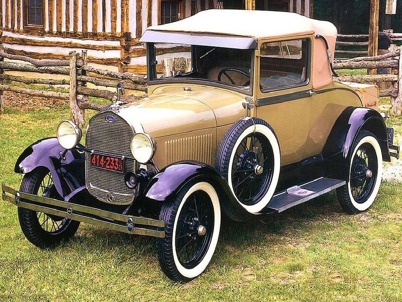 vintage ford car in field