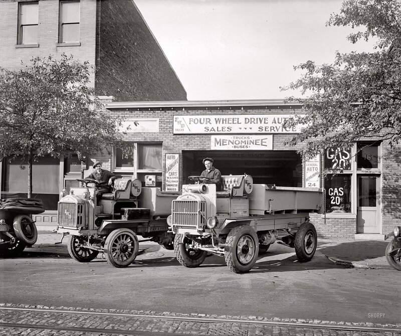 Vintage FWD trucks at auto service