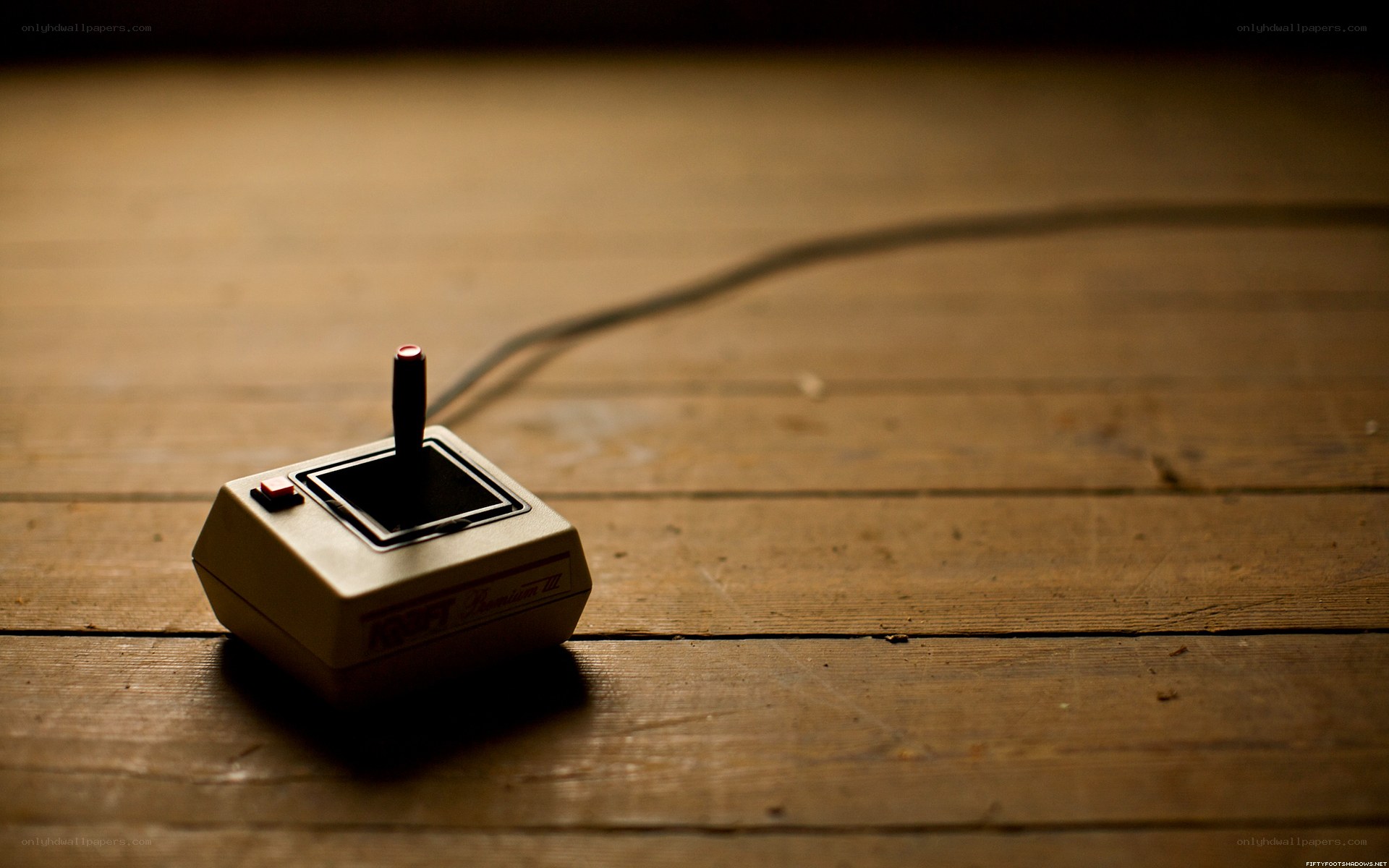 Vintage game controller on wood