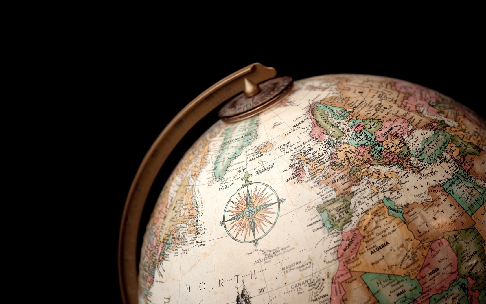 vintage globe with compass rose