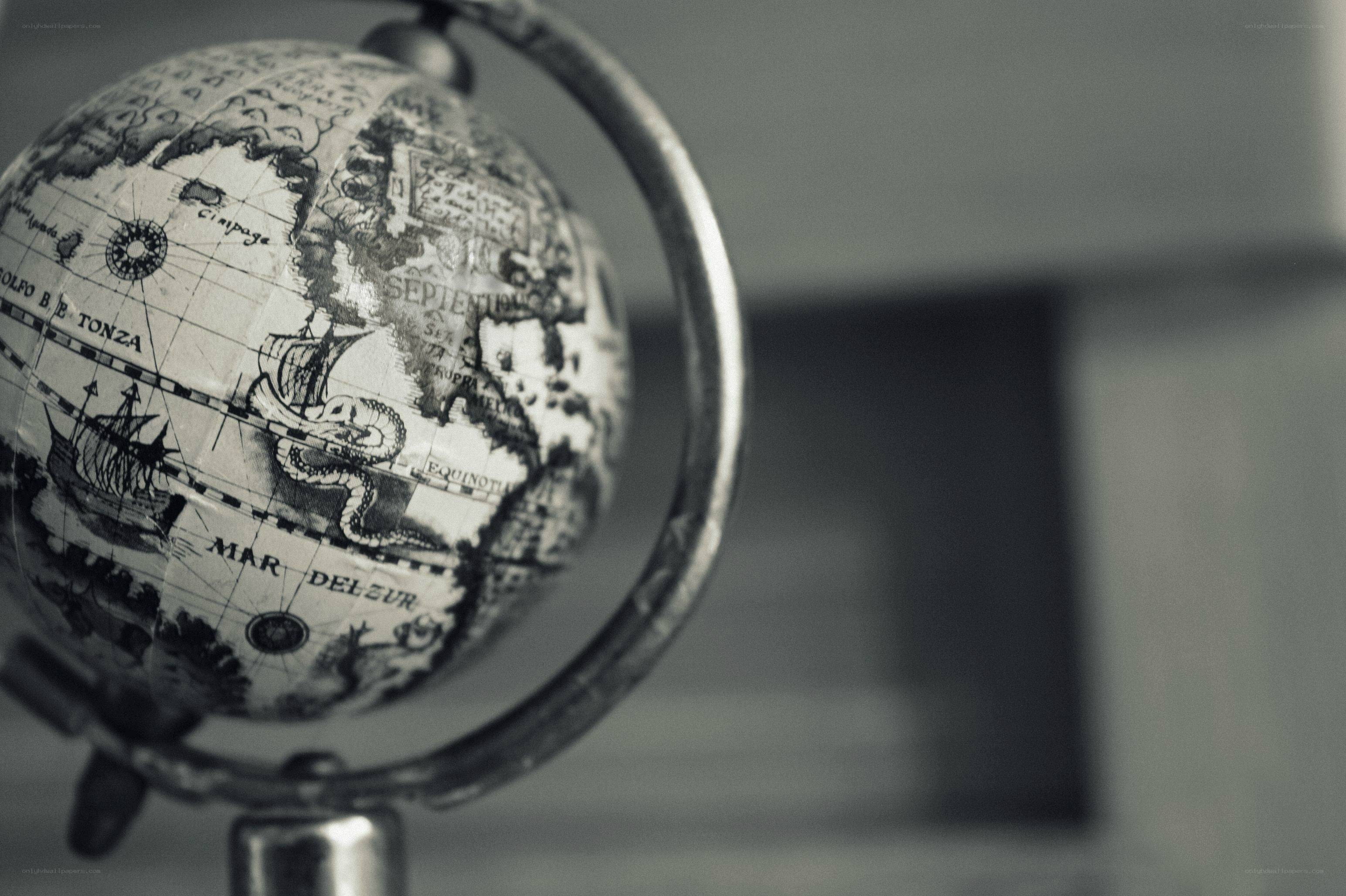vintage globe with old world map