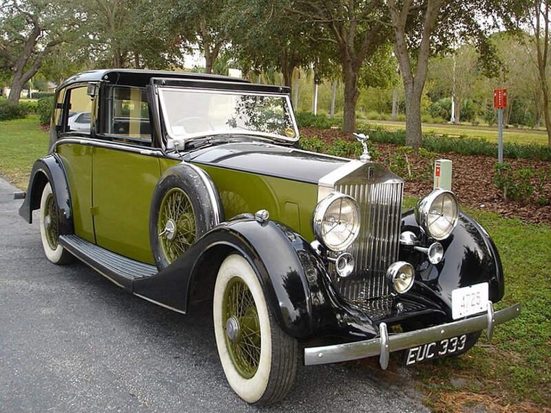 vintage green and black rolls-royce