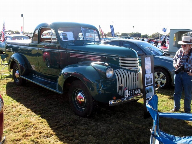 Vintage green pickup truck at show