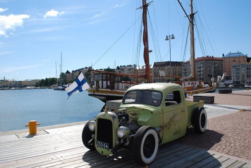 Vintage green truck at harbor