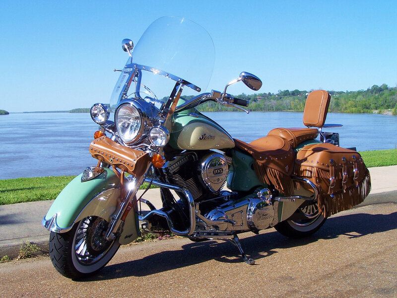 vintage indian motorcycle by the river