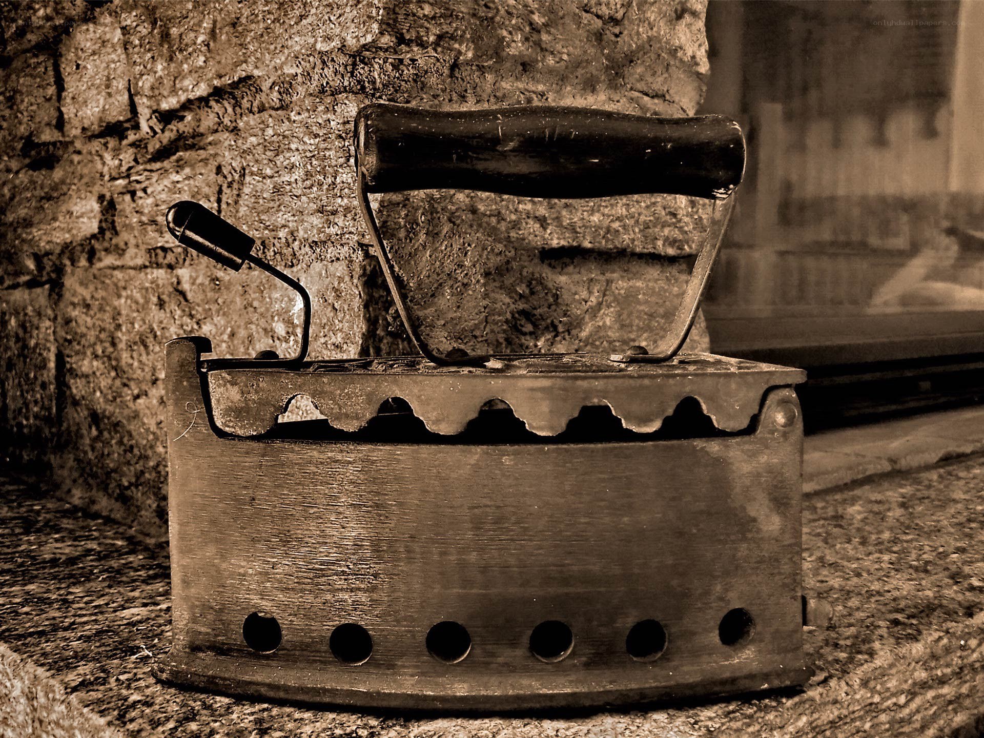 Vintage iron on stone surface