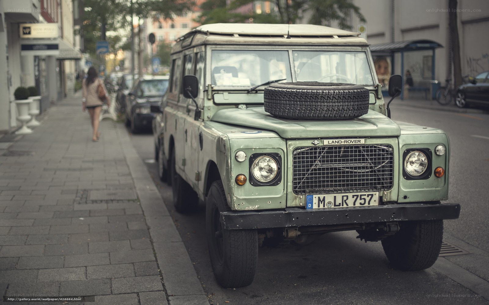 Vintage Land Rover on city street