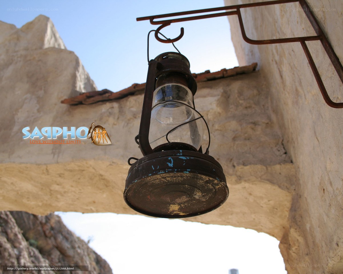 Vintage lantern in stone archway