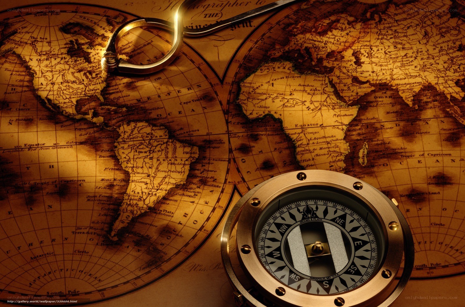 Vintage map with compass and magnifying glass