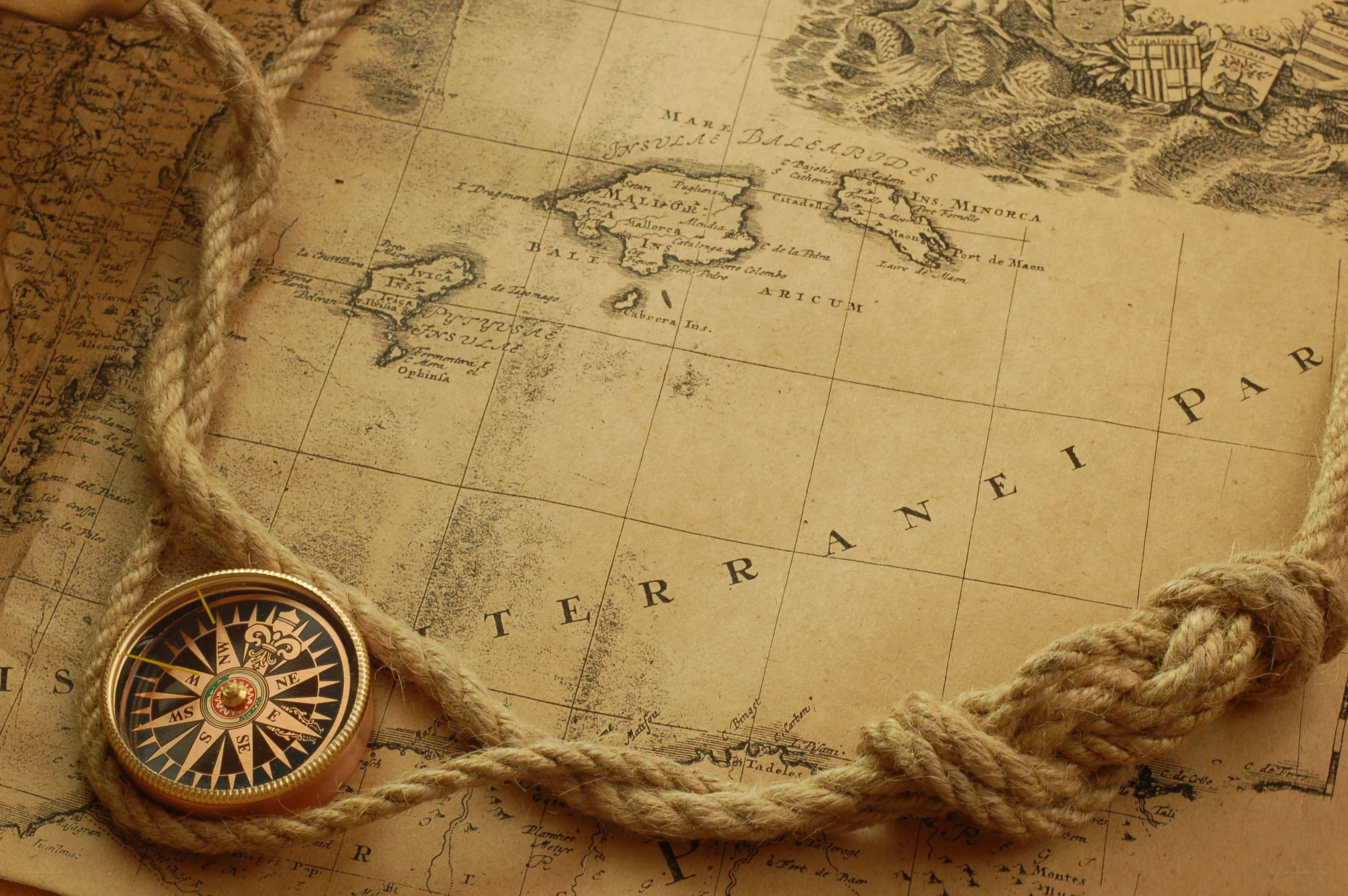 Vintage map with compass and rope