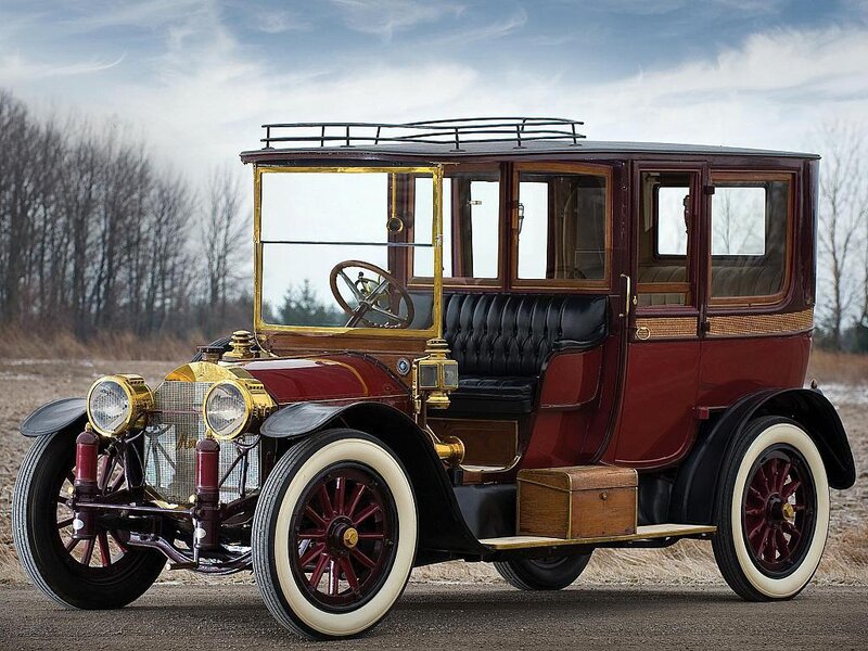 Vintage maroon car with wood trim