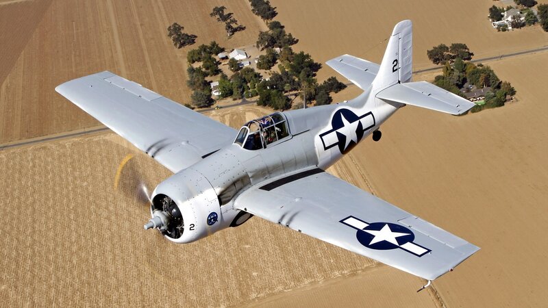 vintage military aircraft in flight