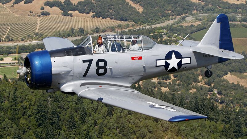 Vintage military aircraft in flight