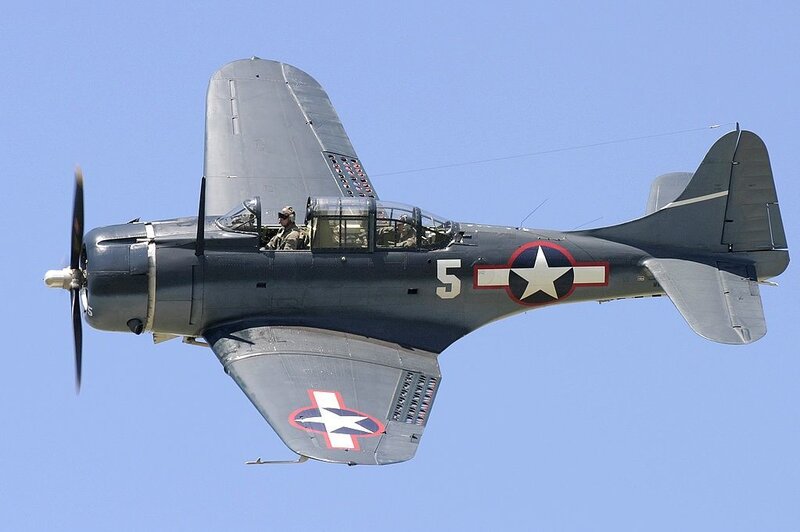 vintage military aircraft in flight