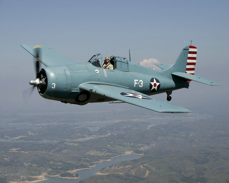 vintage military aircraft in flight