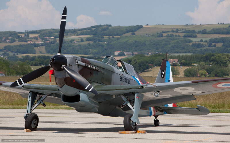 Vintage military aircraft on tarmac