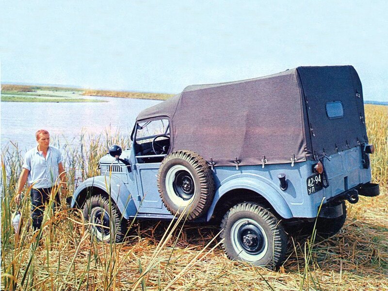 Vintage military jeep by a river